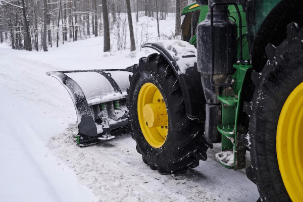 big-special-tractor-is-removing-snow-from-forestal-road_613910-13787 big-special-tractor-is-removing-snow-from-forestal-road_613910-13787