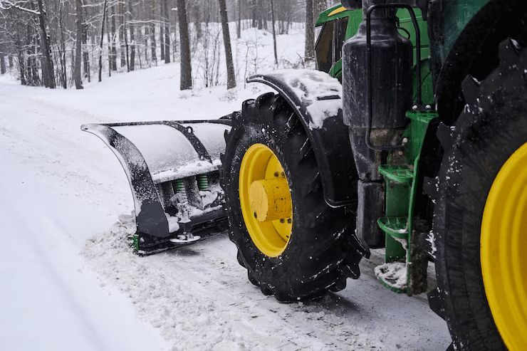 big-special-tractor-is-removing-snow-from-forestal-road_613910-13787
